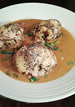 A picture of Boneless Chicken Legs Stuffed with Rice.