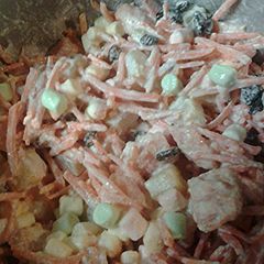 A picture of Carrot and fruit salad.