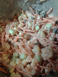 A picture of Carrot and fruit salad.