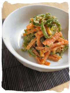 A picture of Bell Pepper & Carrots with Sesame-Miso Dressing.