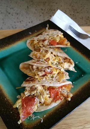 A picture of Poisonhoney's Loaded Breakfast Quesadilla.