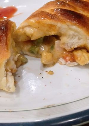 A picture of Chicken cheese bread.