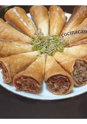 Una foto de Conos rellenos de confit de pato