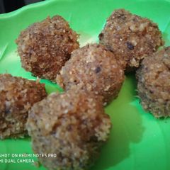 A picture of Nariyal jaggery ladoo.