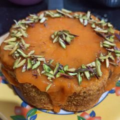 A picture of Mango cake with glaze.