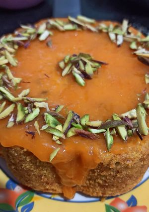 A picture of Mango cake with glaze.