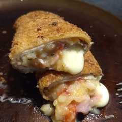 Una foto de Arrolladitos de choclo, jamón y queso!