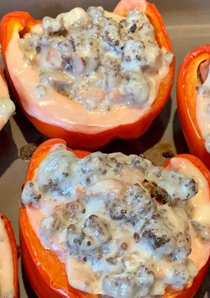 A picture of Ground beef stuffed peppers.