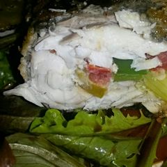 A picture of Sig's Sea Bass, stuffed and then coated in spicy Breadcrumbs.