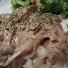 A picture of Brandy cream chicken Alfredo pasta.