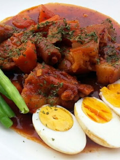 A picture of Pork And Eggs In Wine Stew.