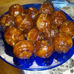 A picture of Bacon wrapped cheese stuffed meatballs.