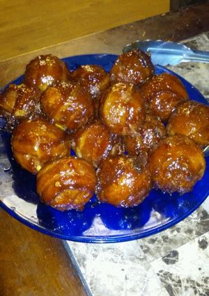 A picture of Bacon wrapped cheese stuffed meatballs.