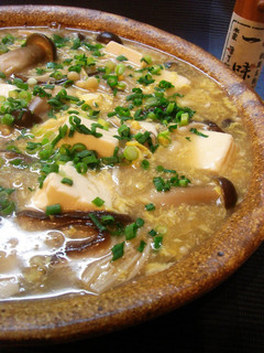 A picture of Mushrooms and Tofu Simmered With Egg.