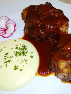 Una foto de Rabo de buey al Pedro Ximénez con puré de patatas