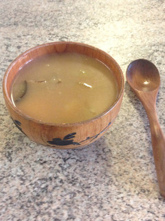 A picture of Miso soup with Aubergine.