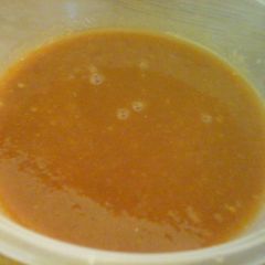 A picture of Tomato and carrot soup.