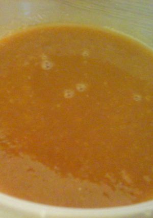 A picture of Tomato and carrot soup.