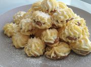 Una foto de profiteroles con margarina