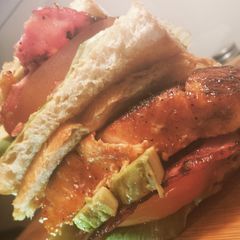 A picture of Bbq Salmon B.L.T w / Turkey Bacon and dijon mustard.