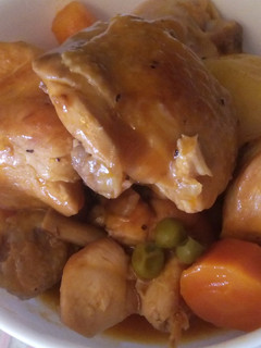 A picture of Chicken with vegetables and sauce by Pam....