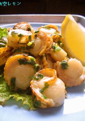 A picture of Baby Scallops with Green Onions and a Salty, Lemon Sauce.