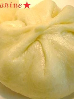 A picture of Puffy Steamed Nikuman (Meat Filled Bao or Buns).