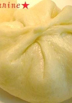 A picture of Puffy Steamed Nikuman (Meat Filled Bao or Buns).