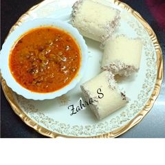 A picture of Puttu & Kadala curry (brown chana curry).