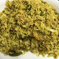A picture of Shredded chicken with fried rice.