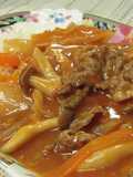 Hashed Beef Stew with Ingredients and Canned Tomatoes at Home