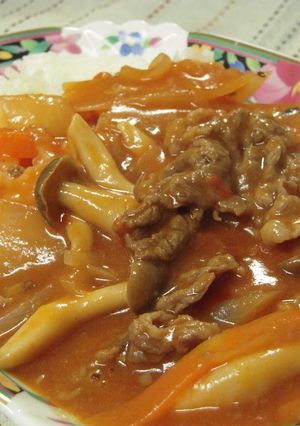 A picture of Hashed Beef Stew with Ingredients and Canned Tomatoes at Home.