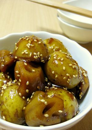 A picture of Stir-fried and Simmered New Potato and Lotus Root with Sesame Seeds.