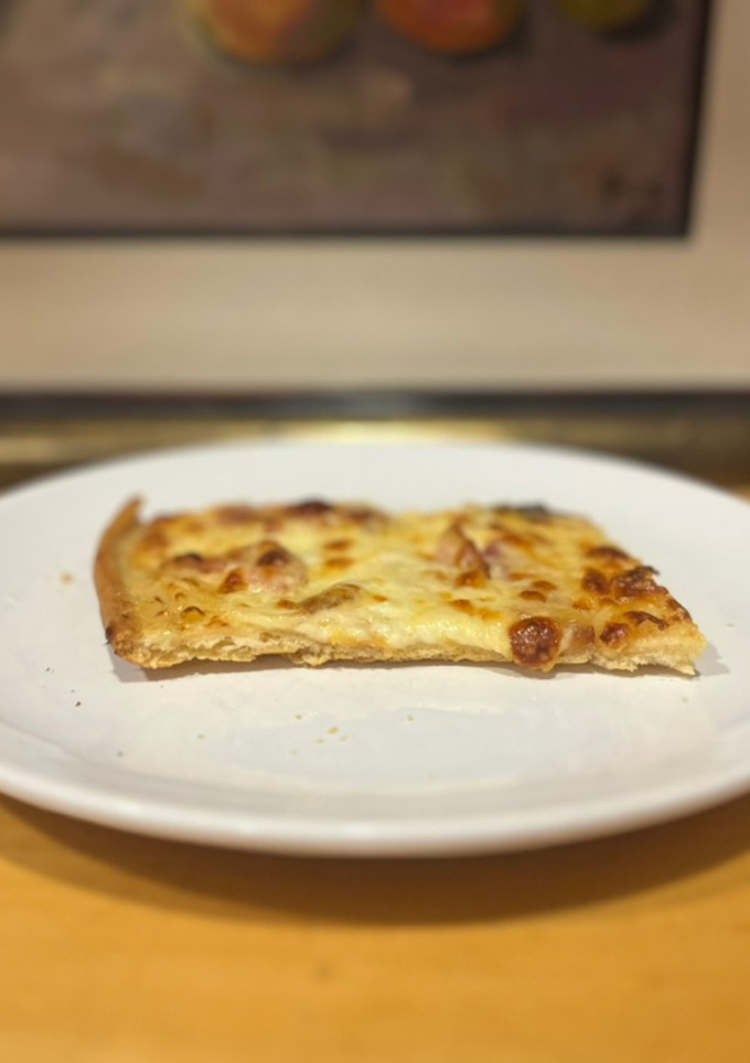 Una foto de Pizza carbonara