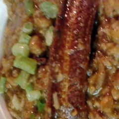 A picture of roasted eel in rice.