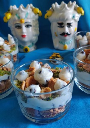 A picture of Sicilian Cannoli in a Cup.
