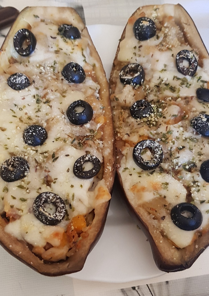 Una foto de Berenjenas rellenas de verduras