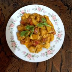 A picture of Chicken boneless with vegetables 🍗🥕🥕🥔.