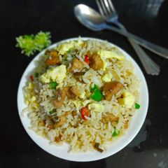 A picture of Chicken fried rice.
