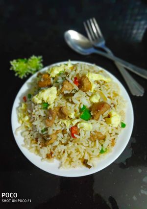A picture of Chicken fried rice.