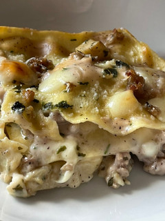 A picture of White Lasagna with Sausage and Porcini Mushrooms.