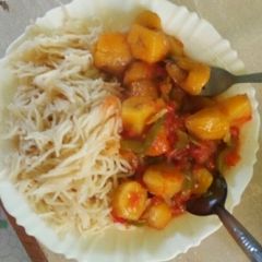 A picture of Spaghetti served with matoke#authormarathon#.