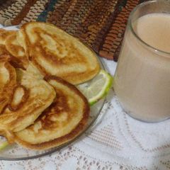 A picture of Tangawizi Tea with Lemon Drop Scones.