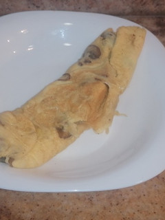Una foto de Tortilla de boletus y champiñón