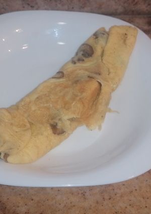 Una foto de Tortilla de boletus y champiñón