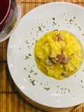 Risotto zafferano con speck e funghi