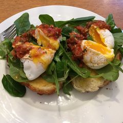 Poached eggs and tomato salsa A picture of Poached eggs and tomato salsa.
