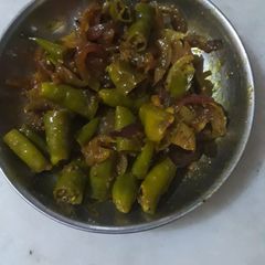 A picture of Green chilli and onion instant pickle.
