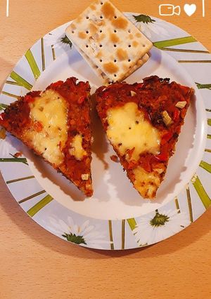 Una foto de Pizza con base de zanahoria