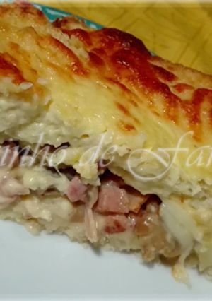 Foto de Pão de forma no forno com bacon, fiambre e cogumelos